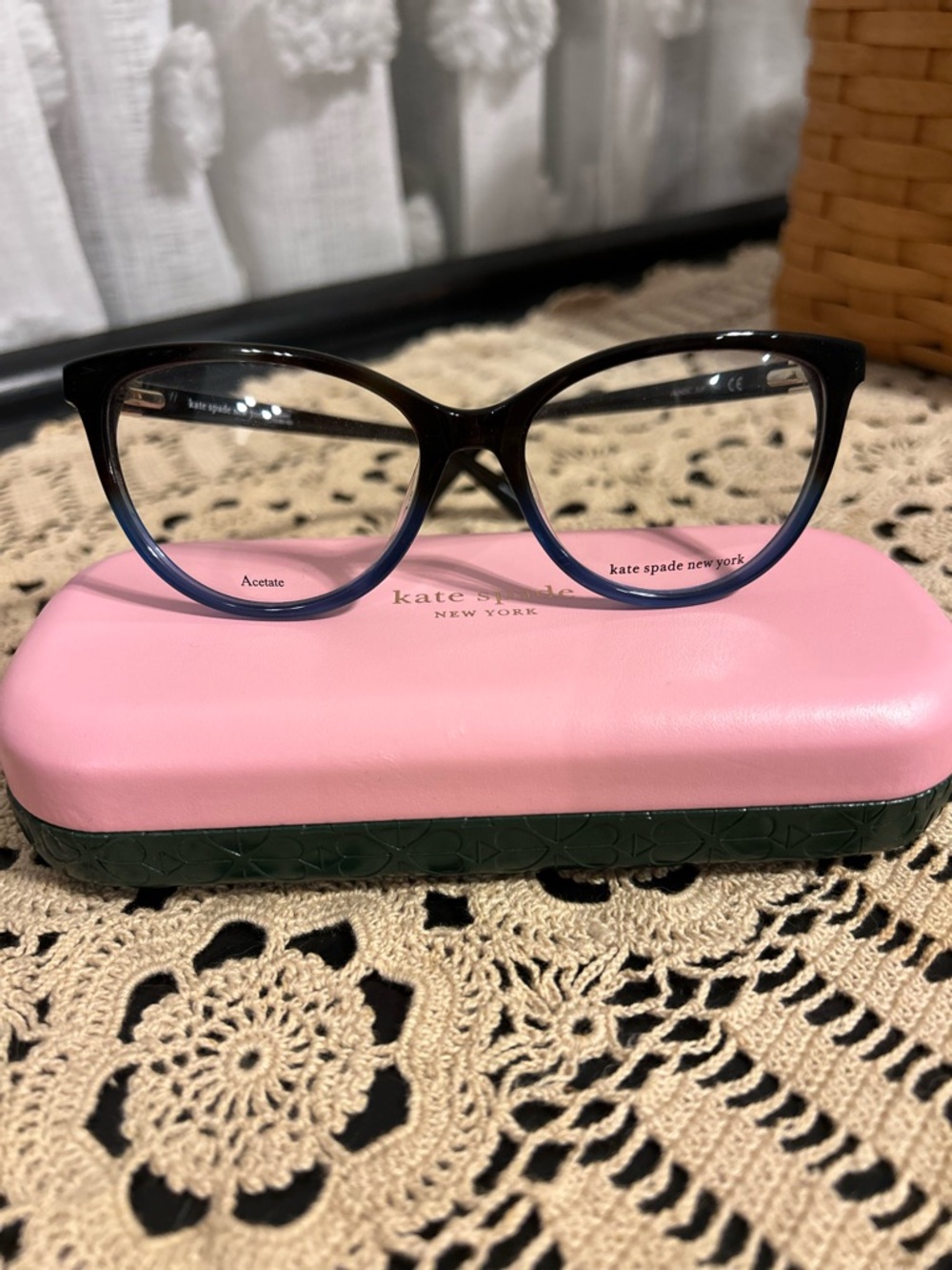 Kate Spade Jalinda black-to-blue gradient cat-eye prescription eyeglasses.